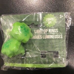NWT St Patrick's Day Set of Green Plastic Light Up Rings